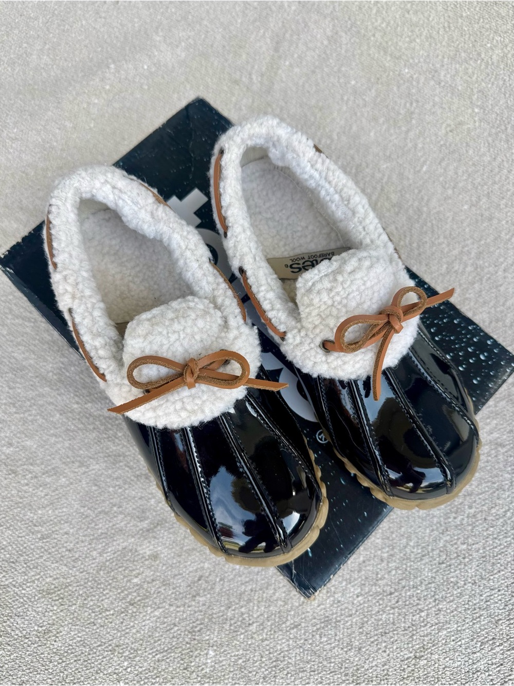 totes Black Patent Shearling-Trim Slip-On Mules with Brown Bow